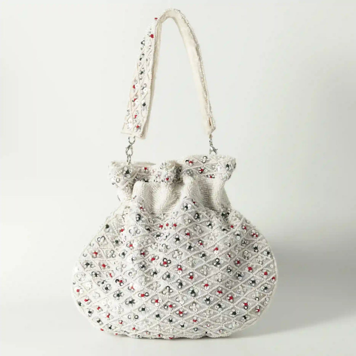 Shubhra Potli Bag with Handle by The Tan Clan, stylish traditional accessory with intricate design and fabric handle.