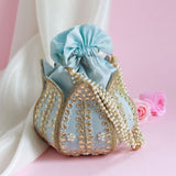 Sindh Kundan Handwork Mini Lotus Potli by The Tan Clan, featuring intricate kundan embroidery and a mini lotus design.