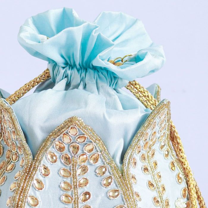 Sindh Kundan Handwork Mini Lotus Potli by The Tan Clan featuring intricate Kundan embroidery and a mini lotus design.