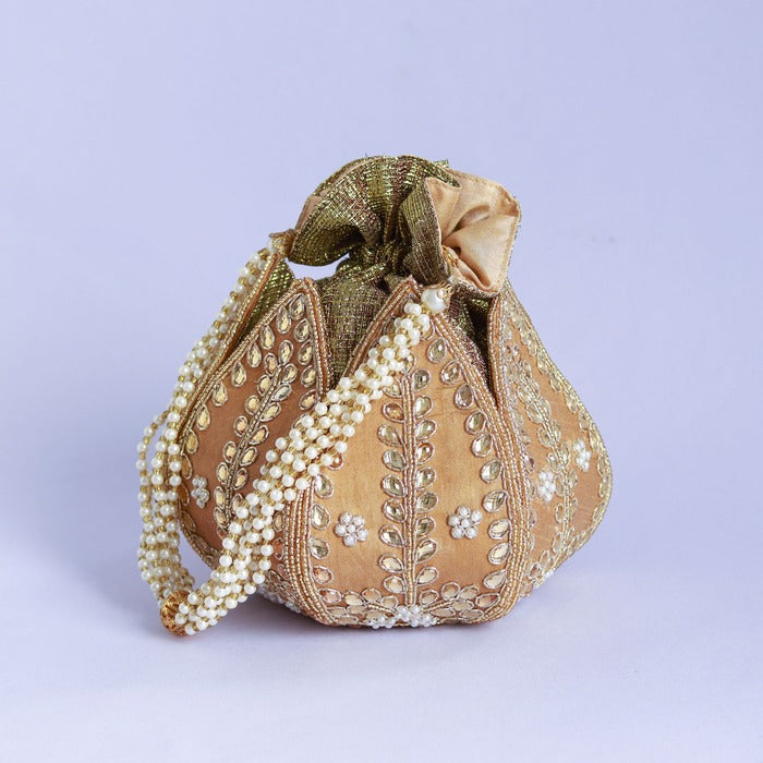 Sindh Kundan Handwork Mini Lotus Potli bag with intricate Kundan detailing and lotus design by The Tan Clan.