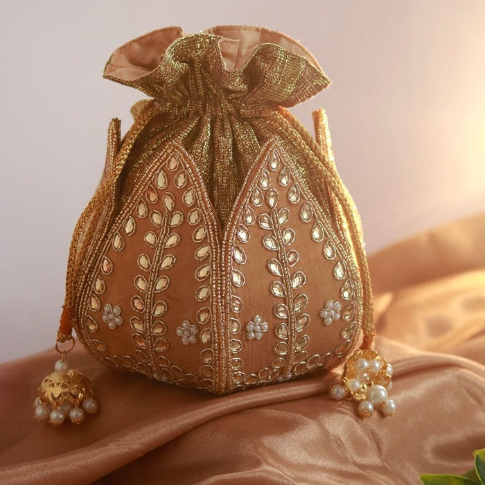 Sindh Kundan Handwork Mini Lotus Potli bag by The Tan Clan with intricate Kundan embroidery and floral lotus design.
