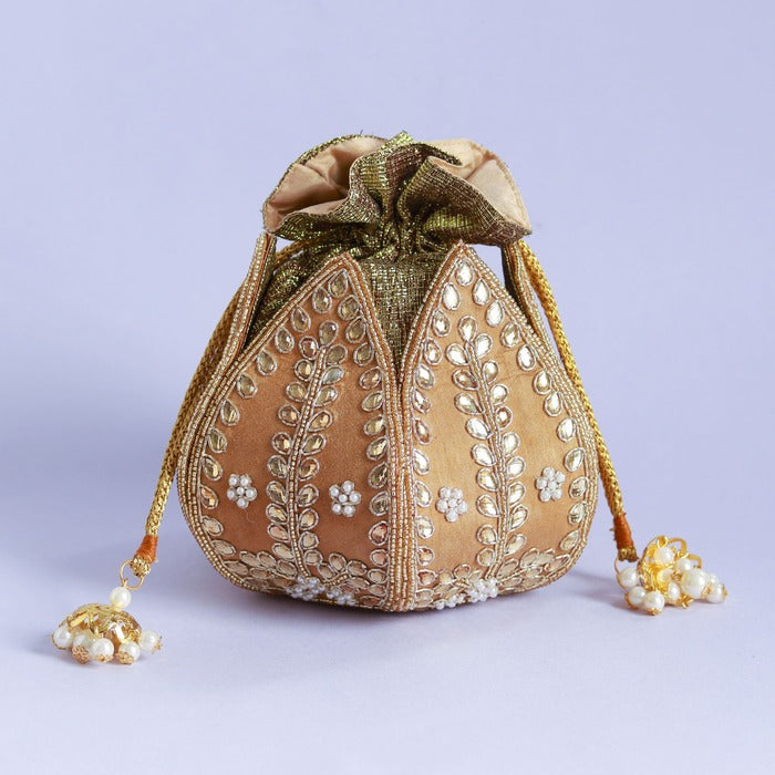 Sindh Kundan Handwork Mini Lotus Potli bag by The Tan Clan with intricate Kundan design and floral lotus motif.