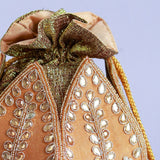 Sindh Kundan handwork mini lotus potli bag by The Tan Clan with intricate Kundan detailing and floral design.