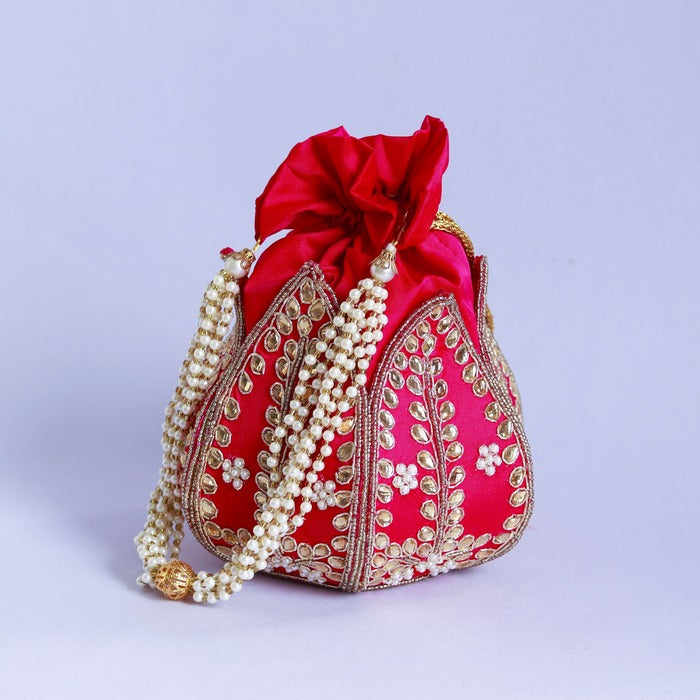 Sindh Kundan handwork mini lotus potli bag with intricate embroidery, traditional Indian accessory by The Tan Clan