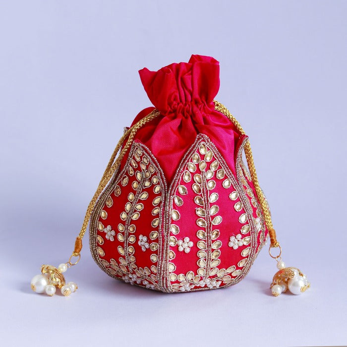 Sindh Kundan Handwork Mini Lotus Potli by The Tan Clan with intricate Kundan embroidery and lotus design, traditional and elegant accessory.