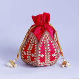 Sindh Kundan Handwork Mini Lotus Potli by The Tan Clan with intricate Kundan embroidery and lotus design, traditional and elegant accessory.