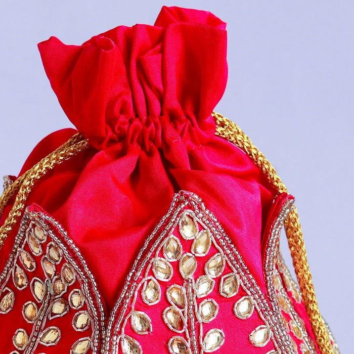 Sindh Kundan Handwork Mini Lotus Potli bag with intricate embroidery and traditional design by The Tan Clan.