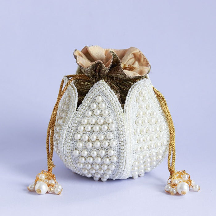 Pearl embroidered mini lotus potli bag with intricate detailing from The Tan Clan, perfect for traditional occasions.