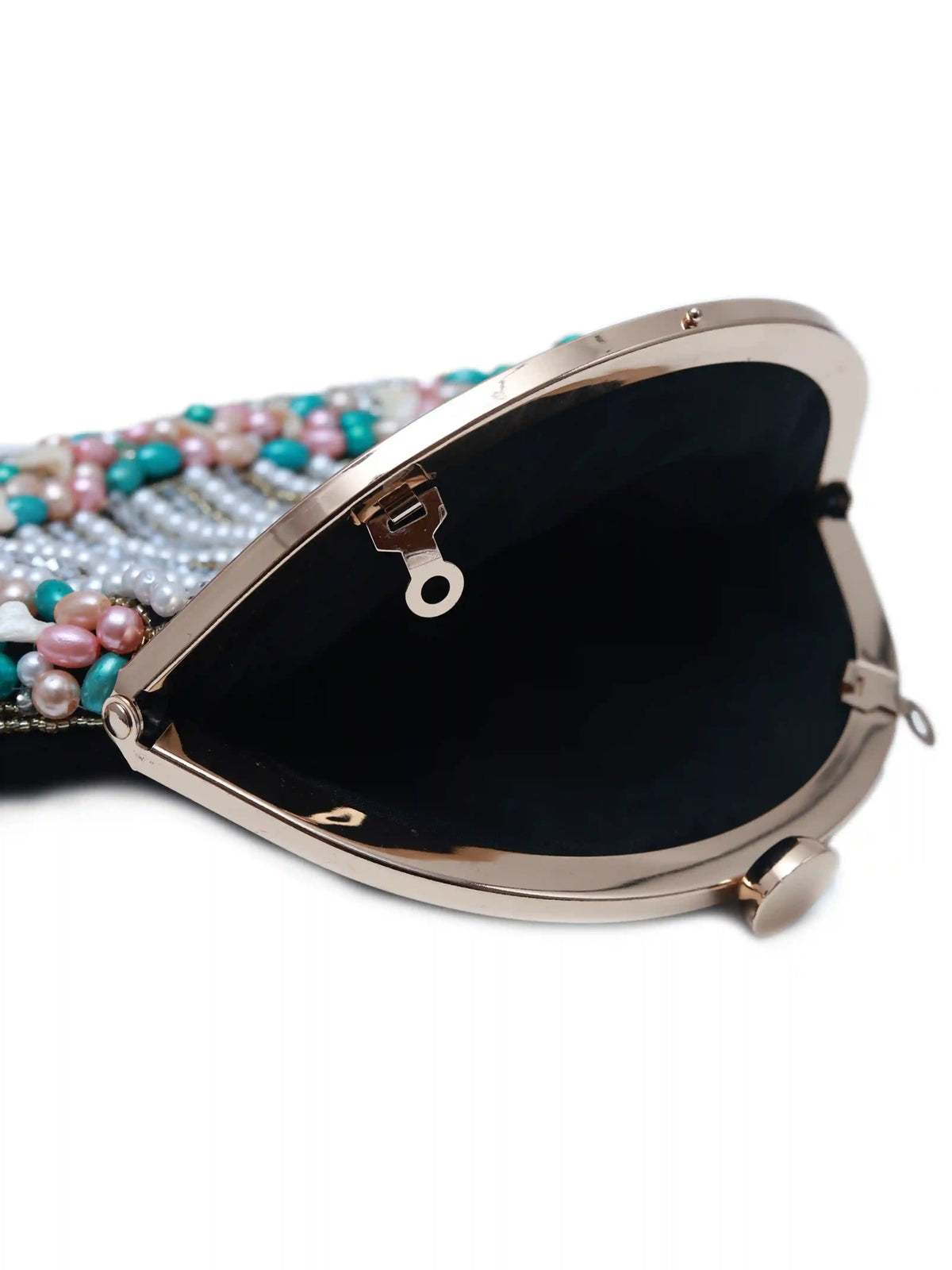 Sona Pearl Tasselled Batua bag with a detachable handle by The Tan Clan, featuring pearl embellishments and tassel details.