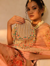Sona Pearl Tasselled Batua with detachable handle by The Tan Clan, featuring pearl embellishments and tassel details.