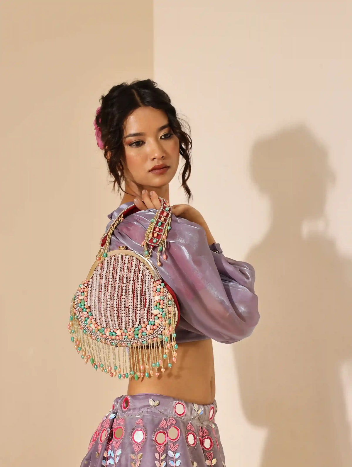 Sona Pearl Tasselled Batua bag by The Tan Clan with detachable handle and pearl tassel embellishments, traditional Indian accessory