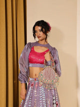 Sona Pearl Tasselled Batua from The Tan Clan featuring pearl embellishments and a detachable handle for versatile use.