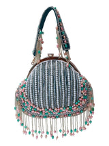 Sona Pearl Tasselled Batua handbag with detachable handle by The Tan Clan, featuring pearl embellishments and tassel details.