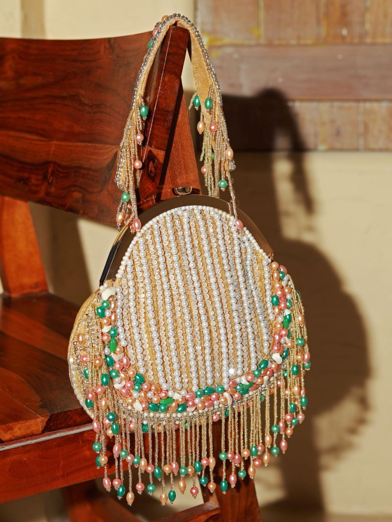 Gold Sona Pearl Tasselled Batua with detachable handle from The Tan Clan, featuring intricate pearl embellishments and traditional design.