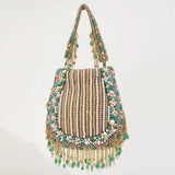 Sona Potli Bag with Handle by The Tan Clan, featuring traditional design and decorative embellishments for festive occasions.