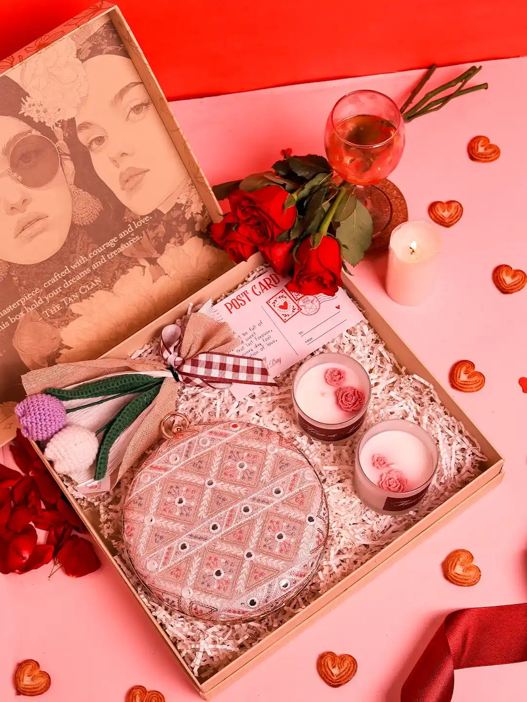 Soul-Care gift set by THE TAN CLAN featuring an Ariba clutch, a candle, and a flower in a set of three.