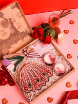Soul-Care gift set featuring a Frida clutch, candle, and flower, with elegant packaging and vibrant colors, by THE TAN CLAN.
