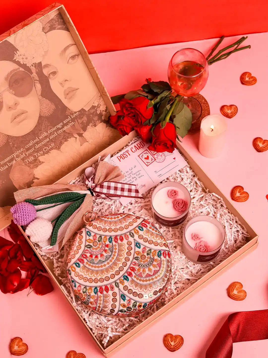 Soul-Care gift set by THE TAN CLAN including a Jashn clutch, candle, and flower in a set of three.