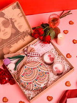 Soul-Care gift set by THE TAN CLAN including a Jashn clutch, candle, and flower in a set of three.