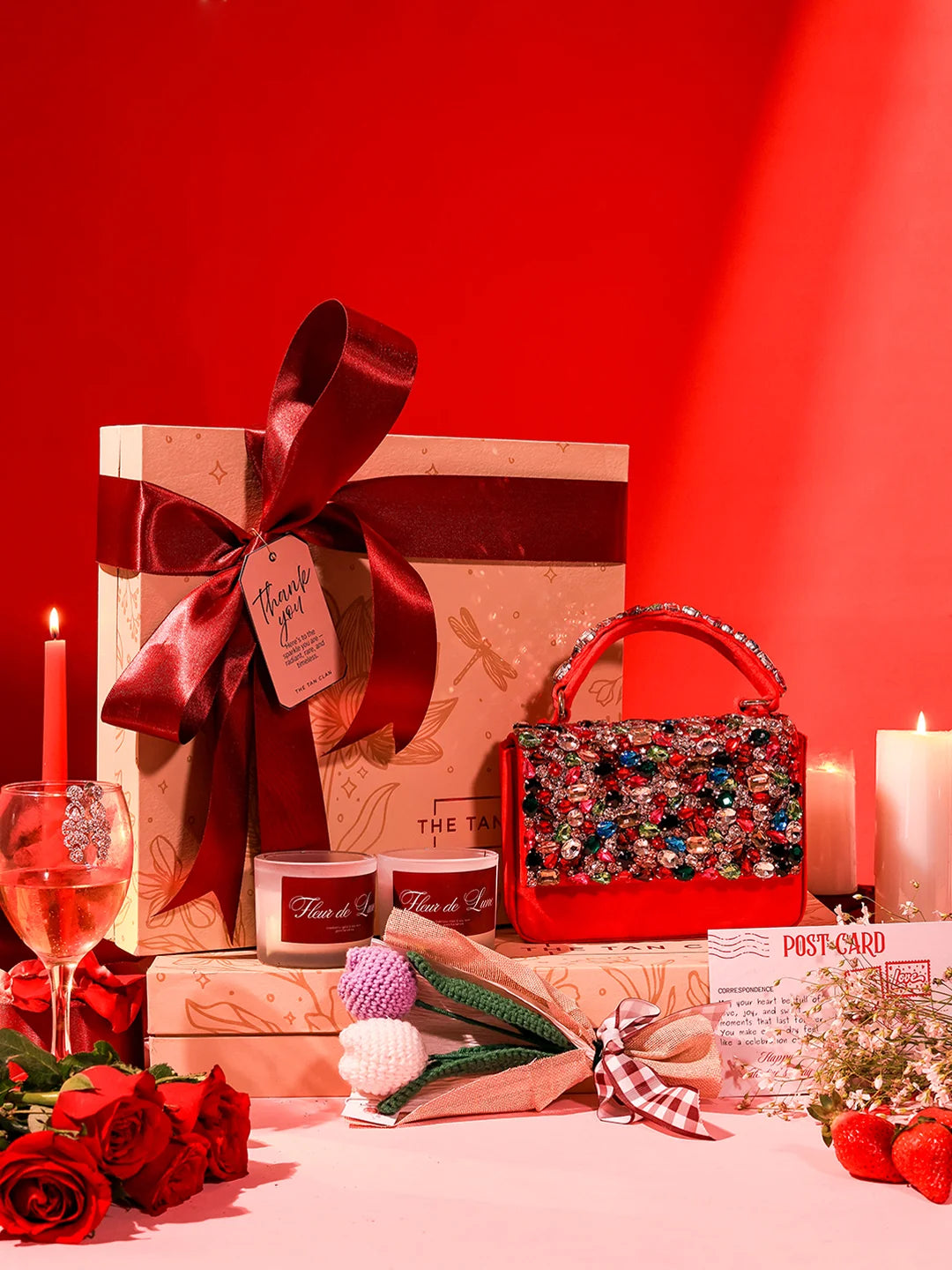 Soul-Care gift set featuring a Kylie clutch, candle, and flower from THE TAN CLAN, arranged together in an elegant display.