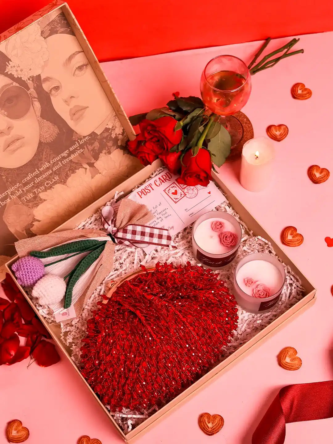 Soul-Care gift set featuring a pink Rosa clutch, candle, and flower arrangement, from THE TAN CLAN, styled together in a set of three.