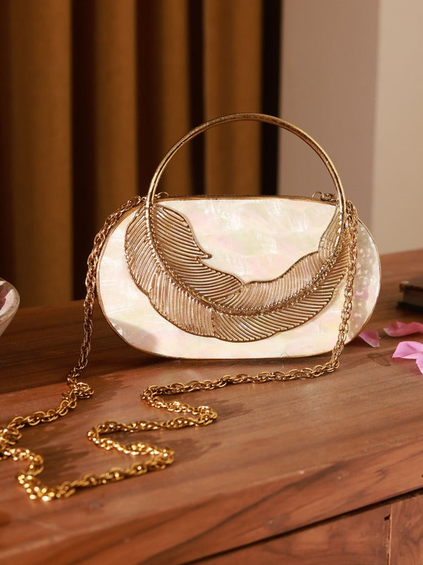 Stella Mother of Pearl Clutch by The Tan Clan featuring iridescent mother of pearl exterior and elegant fold-over design.