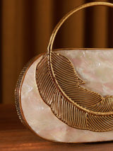 Stella Mother of Pearl Clutch by The Tan Clan featuring iridescent pearl finish and elegant design for evening occasions.
