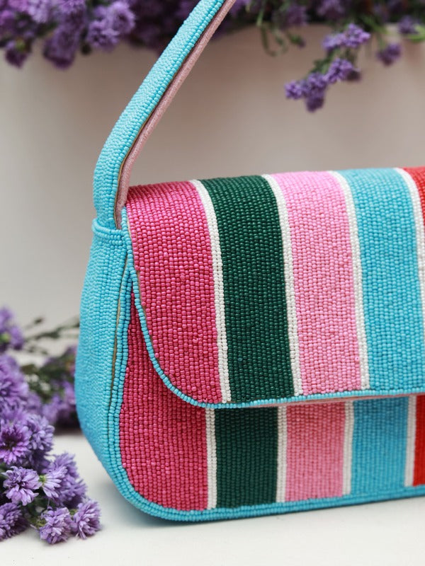 Stripe multicolor baguette bag with handle by The Tan Clan, featuring bold horizontal stripes and a sleek, compact design.