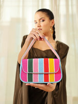 Multicolor stripe baguette bag with handle by The Tan Clan, featuring a compact, stylish design with vibrant horizontal stripes.