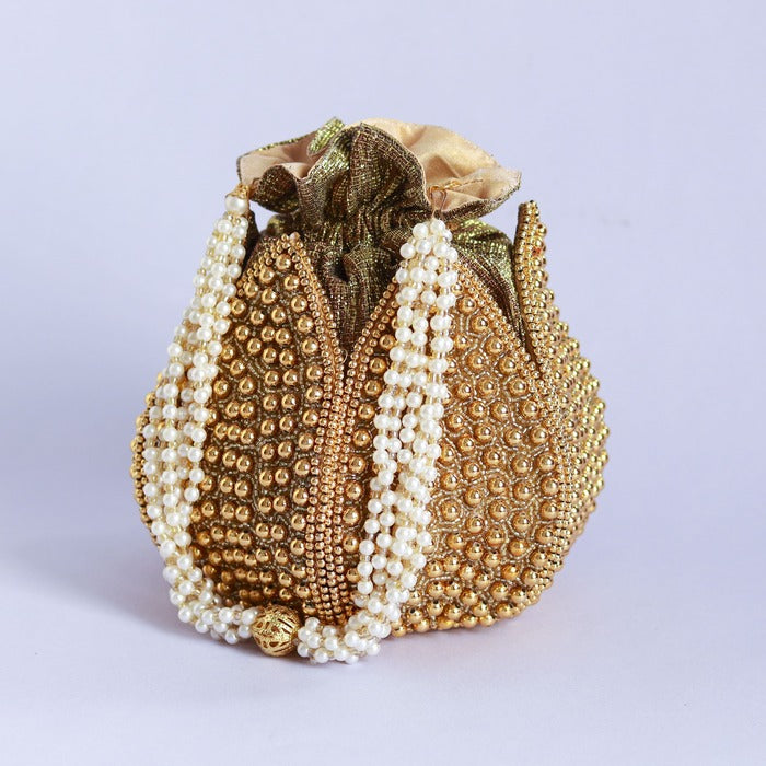 Embroidered mini lotus potli bag with intricate motifs from The Tan Clan, featuring traditional Indian embroidery and a drawstring closure.