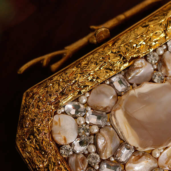 Swarn Combo featuring THE TAN CLAN Burj Agate Stone clutch and mini lotus potli bag, elegant traditional Indian accessories.