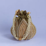 Swarn hand embroidered mini lotus potli bag with intricate embroidery, traditional Indian accessory by The Tan Clan.