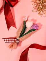 Sweet Flower Gift Set by THE TAN CLAN with Rosa Potli, fresh flowers, and chocolates in a set of three.