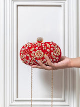 Set of two Baiza Clutch Sweet Treat Hampers from THE TAN CLAN with chocolates, displayed with elegant packaging and accessories.