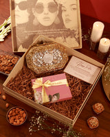 Sweet Treat Hamper from The Tan Clan featuring assorted confections and festive packaging in a luxurious gift box.