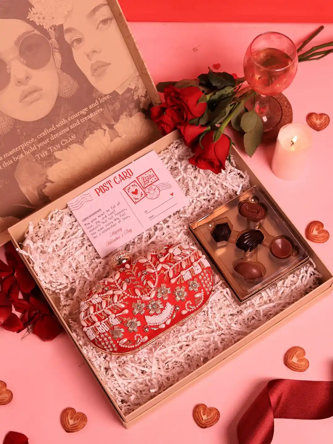 Set of 2 THE TAN CLAN Sweet Treat Hamper Elizah Clutch with chocolates, featuring elegant clutch bags and assorted chocolates.