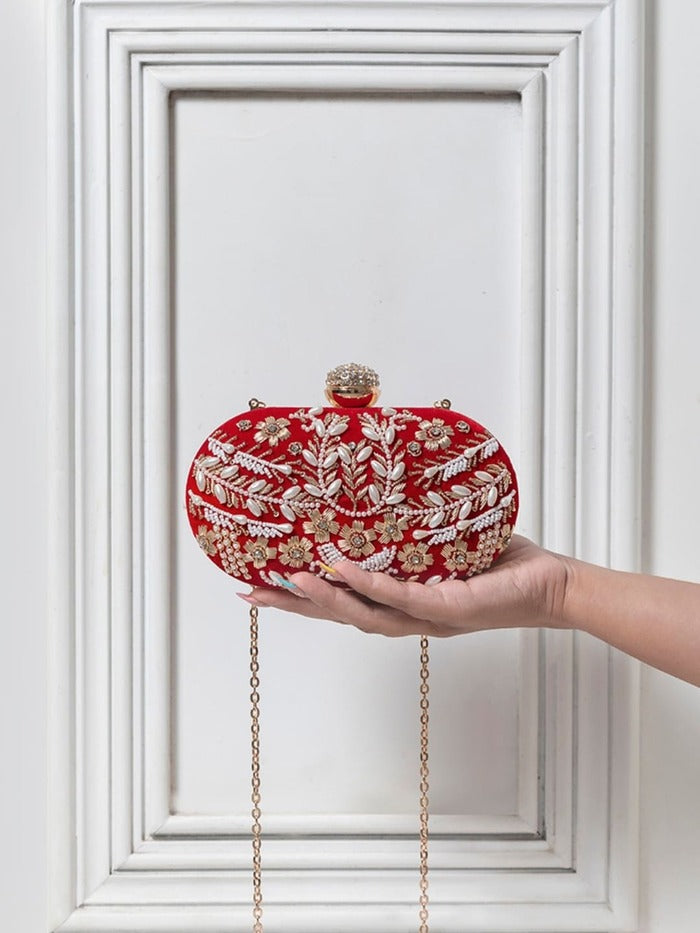 Set of 2 Elizah Clutch sweet treat hampers with chocolates from THE TAN CLAN, featuring elegant clutch designs and assorted chocolates.