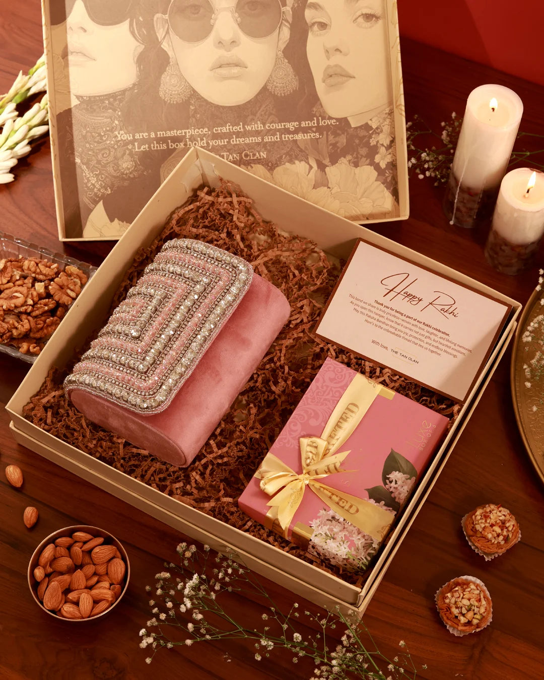Nysa Pink Sweet Treat Hamper by The Tan Clan with assorted chocolates, candies, and sweet snacks in a pink-themed gift box.