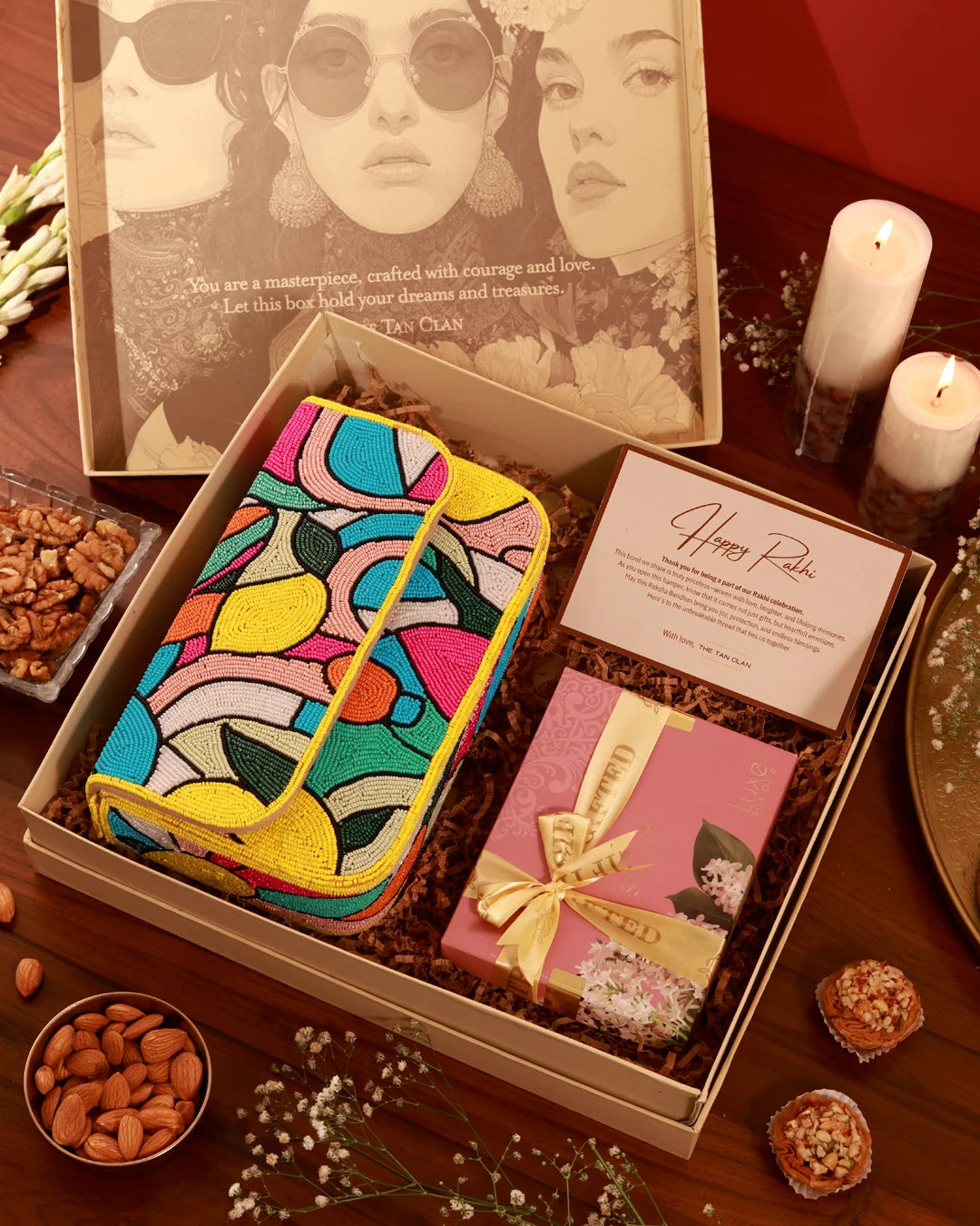 Sweet Treat Hamper by The Tan Clan featuring assorted chocolates and candies in a decorative gift basket.