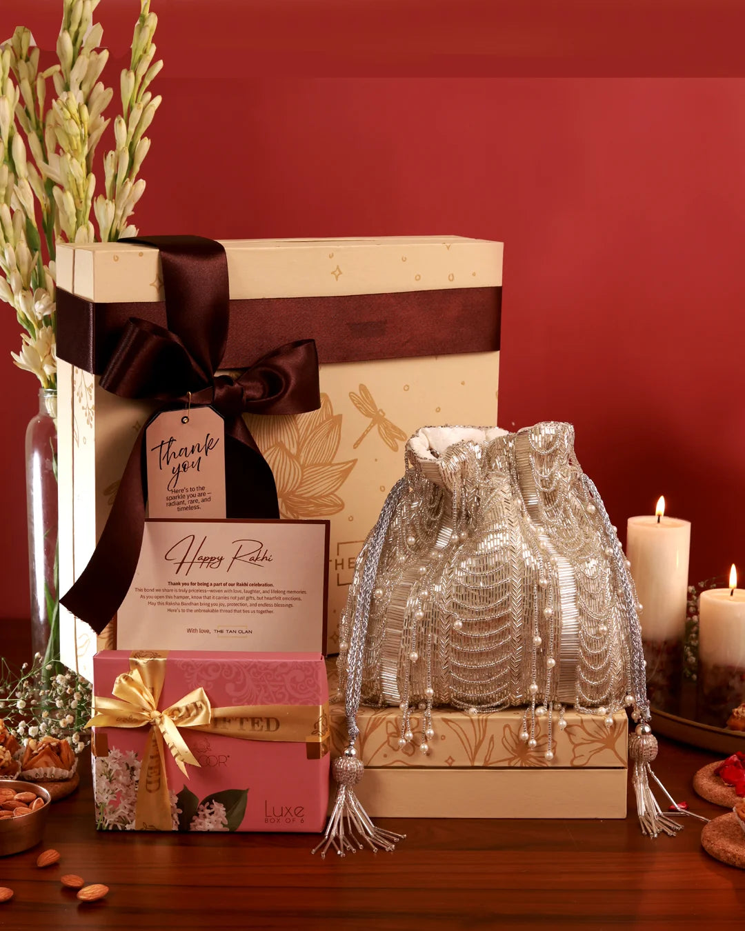 Sweet Treat Hamper by The Tan Clan featuring assorted chocolates, candies, and confections in a decorative gift box.