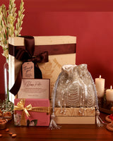 Sweet Treat Hamper by The Tan Clan featuring assorted chocolates, candies, and confections in a decorative gift box.