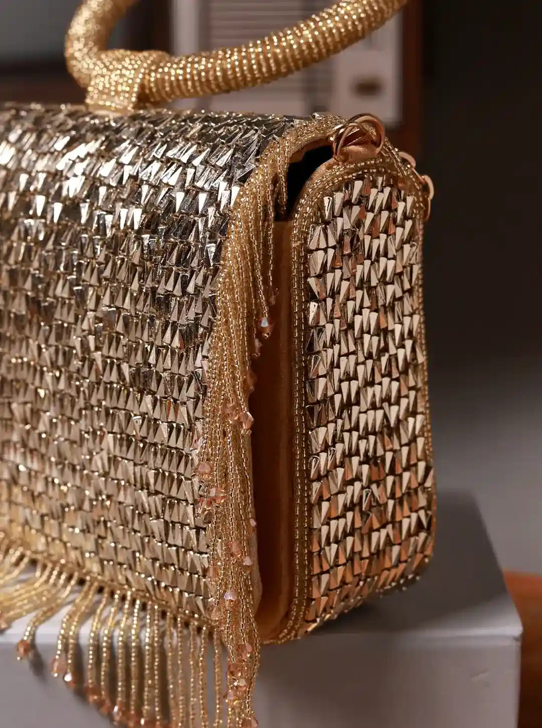Sylvie Gold Flap Over Bag by The Tan Clan, stylish flap bag with gold accents and elegant design, displayed with a matching embellished clutch.