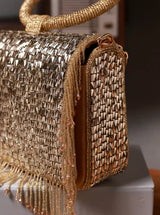 Sylvie Gold Flap Over Bag by The Tan Clan, stylish flap bag with gold accents and elegant design, displayed with a matching embellished clutch.