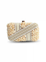 Saliha hand-embroidered clutch with gold flap and intricate embellishments, stylish accessory from The Tan Clan.