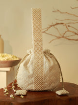 Elegant Taj Pearl Potli Bag with handle from The Tan Clan, featuring intricate pearl detailing and traditional craftsmanship.