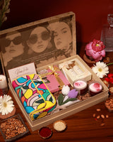 The Luxe Affair Hamper Poppy by The Tan Clan, featuring a luxury gift basket with elegant packaging and assorted premium treats.