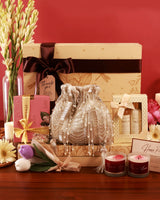 Elegant gift hamper from The Tan Clan's The Luxe Affair collection, featuring luxurious items arranged in a stylish basket.