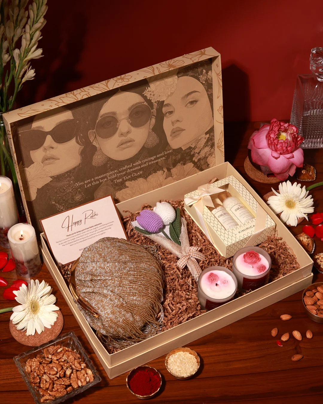 Elegant Luxe Blossom Hamper by The Tan Clan featuring beautifully arranged flowers and luxury gift items.