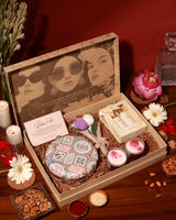 Elegant Luxe Blossom Hamper by The Tan Clan featuring a beautifully arranged selection of gifts in a Mughal-inspired design.