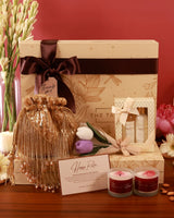 Elegant Luxe Blossom Hamper by The Tan Clan featuring a beautifully arranged gift with flowers and luxury products.